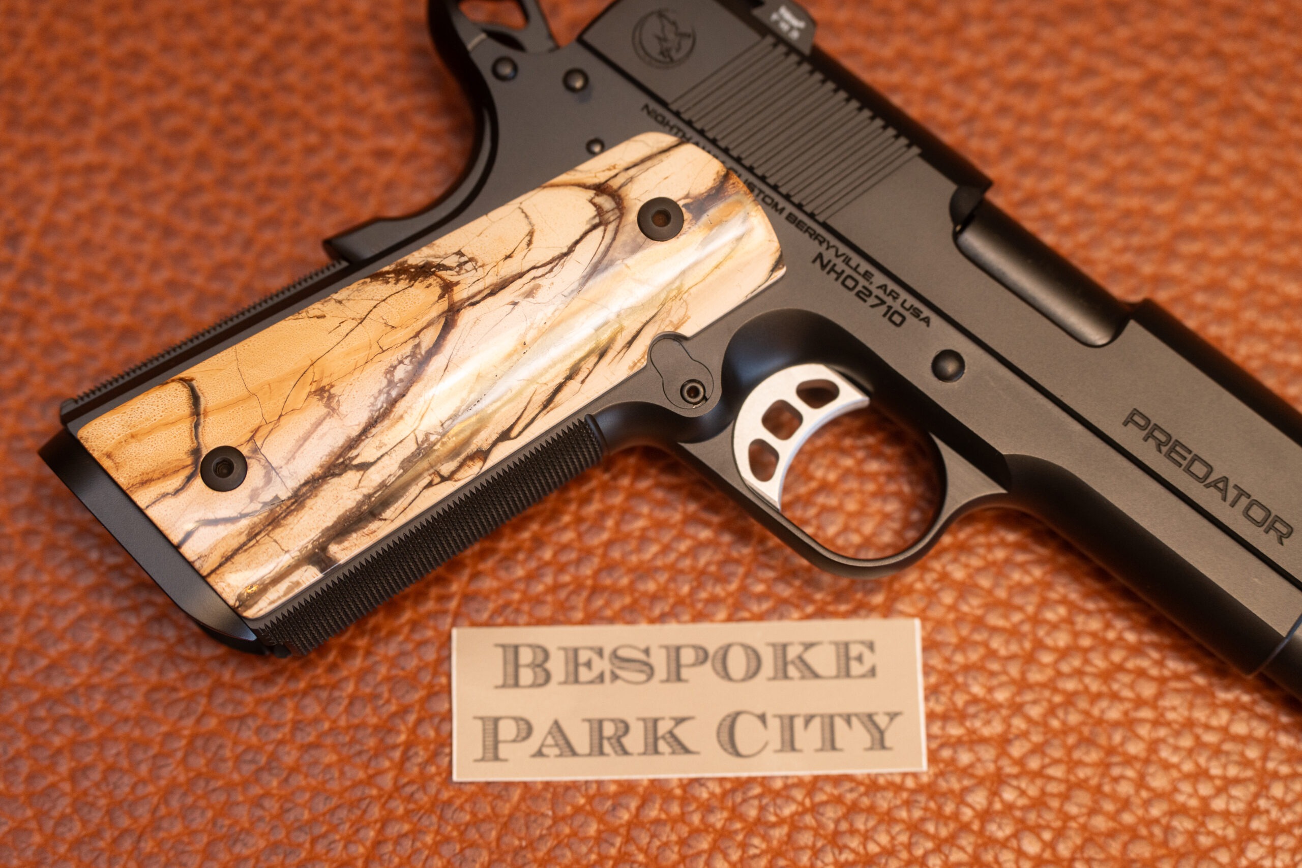 Nighthawk Cross Cut Mammoth Ivory grips